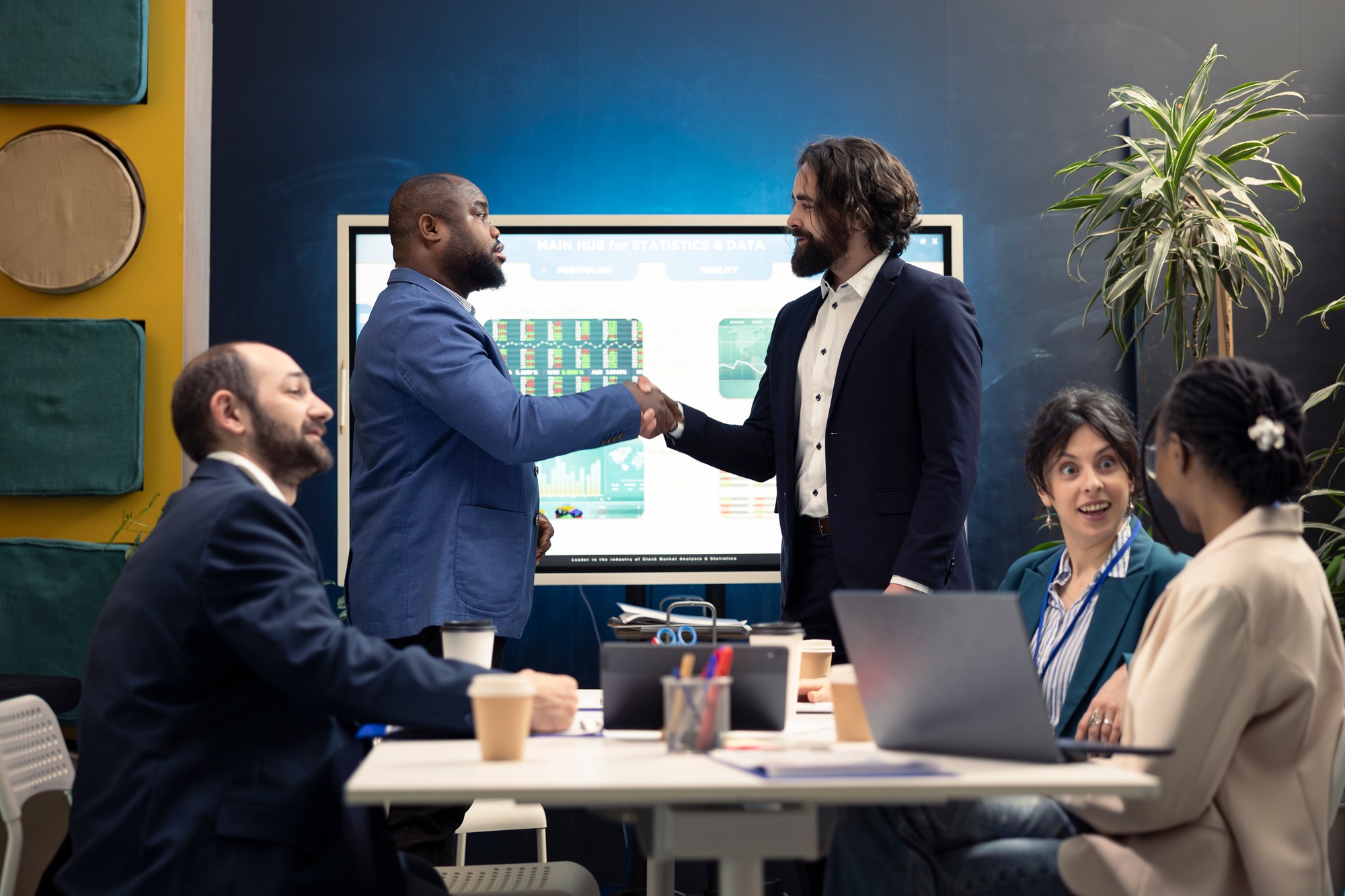 Business partners celebrate the starting point of a project between their firms