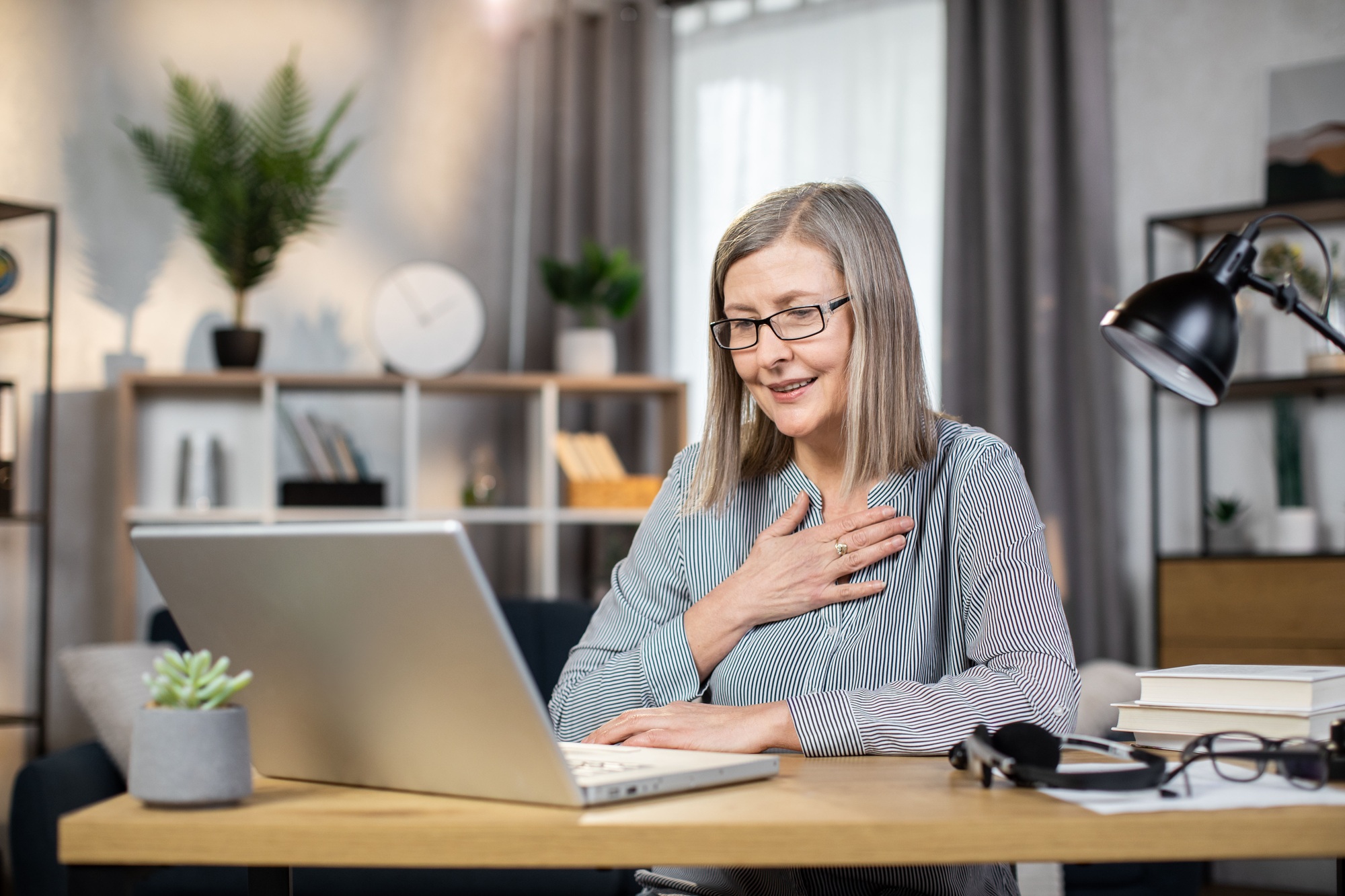 Female leader making video call while working from home
